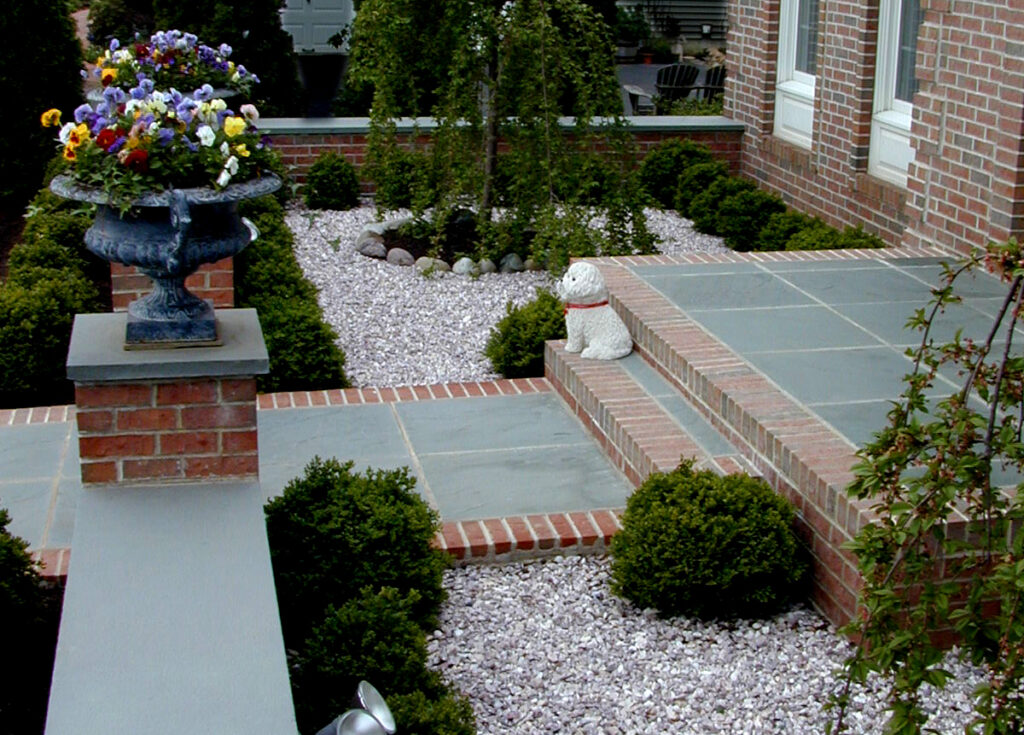 Matching Brick with Blue Stone Walkway and Cap / Gravel Courtyards with Japanese Accents